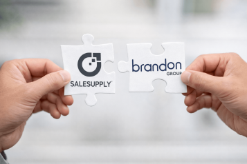 2 pezzi di puzzle coordinati con i loghi di Salesupply e Brandon Group